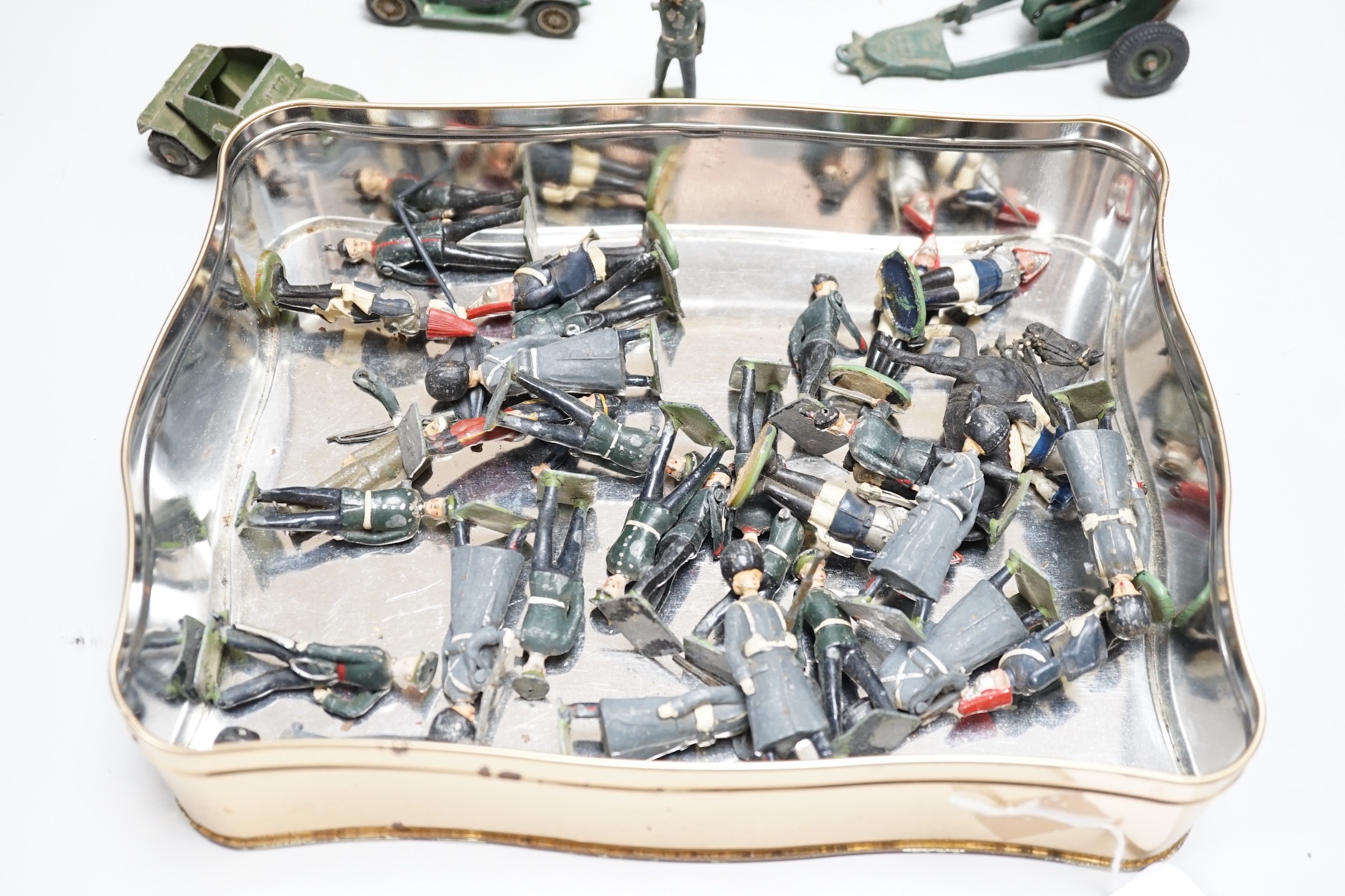 A quantity of military toy lead soldiers, artillery etc.